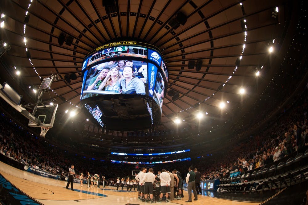 <p>The Spartans huddle during a timeout March 28, 2014 during the game against Virginia at Madison Square Garden in New York City during the NCAA tournament. The Spartans won, 61-59. Julia Nagy/The State News</p>