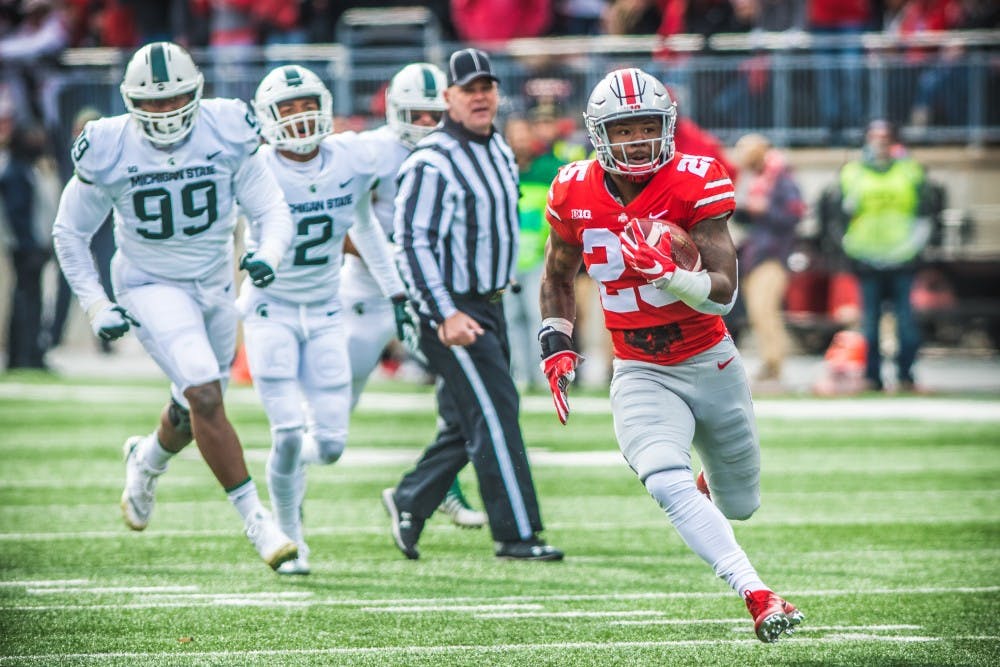 Ohio State running back Mike Weber (25) breaks free into open space during the game against Ohio State, on Nov. 11, 2017, at Ohio Stadium. The Spartans were defeated by the Buckeys, 48-3.