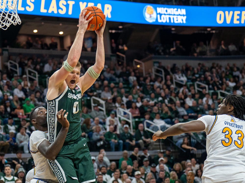 <p>Michigan State's forward and senior Jaxon Kohler (0) catches the basketball ahead of San Jose State at the Breslin Center in East Lansing, Michigan on Thursday, Nov. 13, 2025.</p>