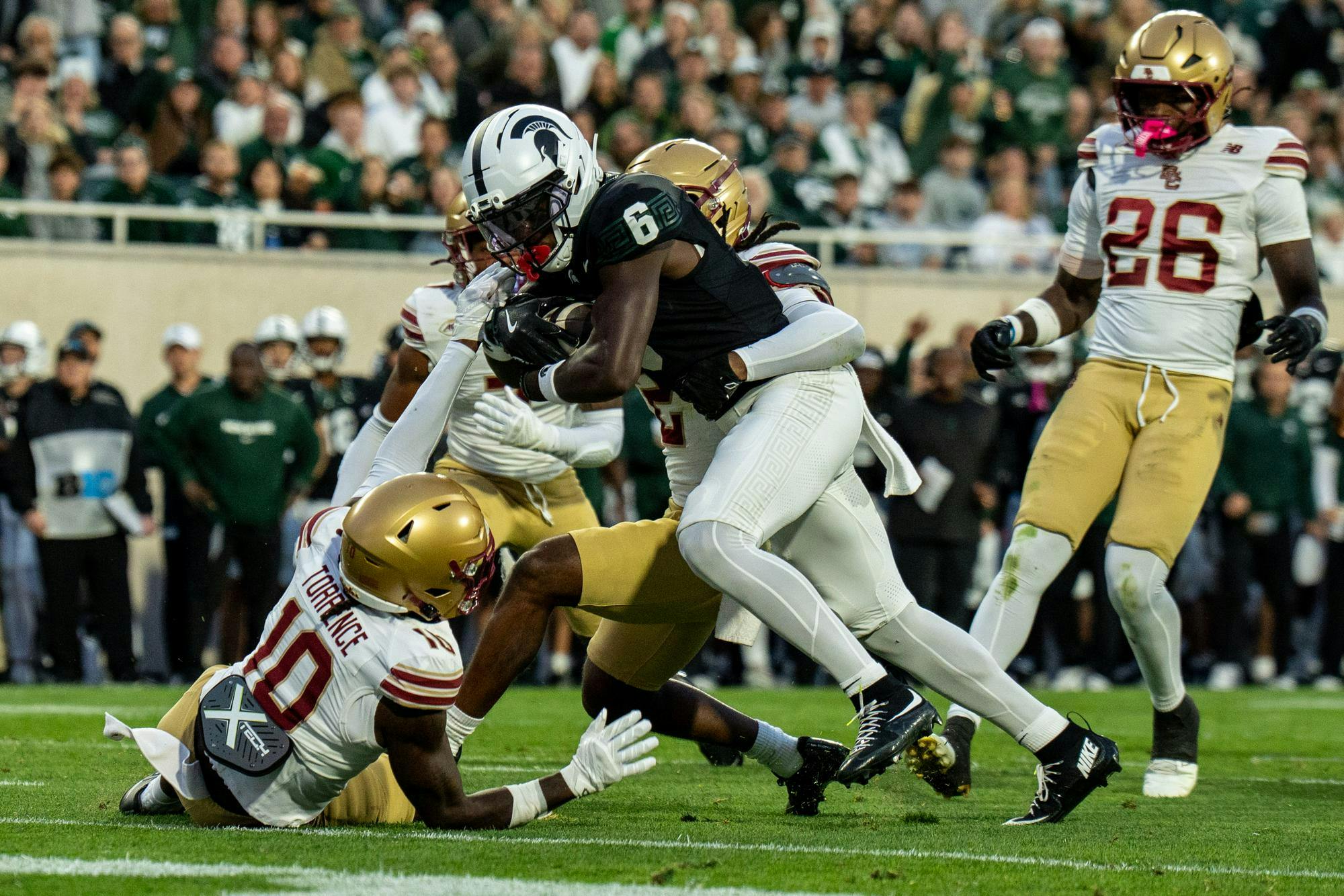 <p>Michigan State Spartans wide receiver Nick Marsh (6) attempts a touchdown during the Michigan State University versus Boston College football game at Spartan Stadium in East Lansing, Michigan on Sept. 6, 2025.</p>