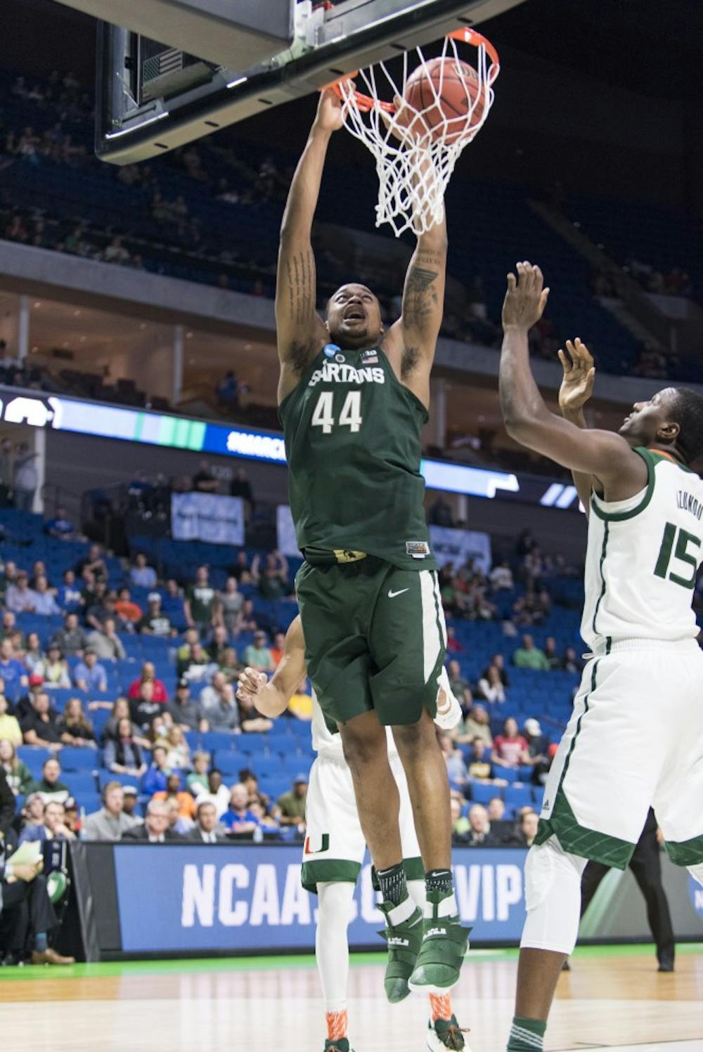 Freshman forward Nick Ward (44) dunks the ball during the second half of the game against University of Miami (Fla.) in the first round of the Men's NCAA Tournament on March 17, 2017 at  at the BOK Center in Tulsa, Okla.The Spartans defeated  the Hurricanes, 78-58.