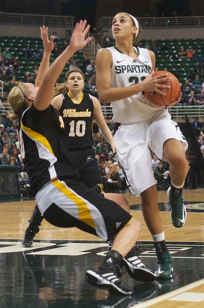 	<p>Junior guard Klarissa Bell is called for a charge on Wisconsin-Milwaukee forward Sami Tucker on Saturday, Dec. 1, 2012, at Breslin Center. The Spartans defeated Wisconsin-Milwaukee, 81-50, improving their overall record to 7-0. Adam Toolin/The State News</p>