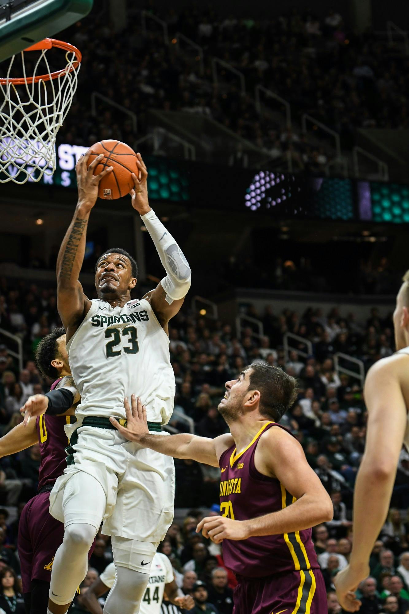 <p>Junior forward Xavier Tillman (23) makes a layup during the game against Minnesota at the Breslin Center on Jan. 9, 2020. The Spartans defeated the Golden Gophers 74-58.</p>