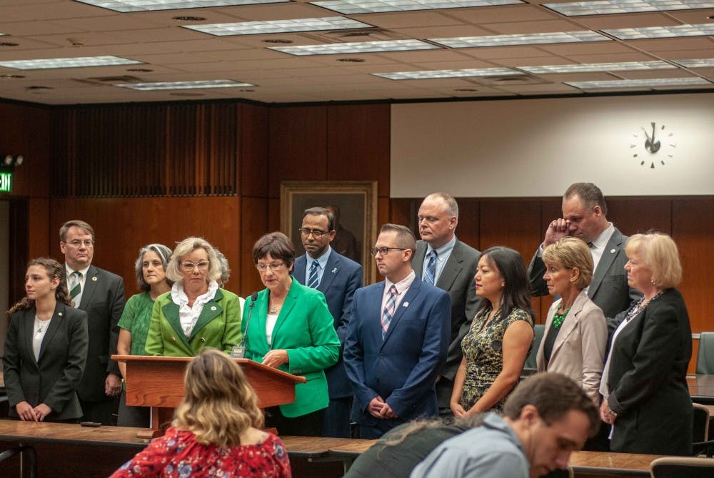 Members of the Presidential Search Committee gather with members of the Board of Trustees at the meeting on the update of the presidential search process at the Hannah Administration Building on Aug. 22, 2018.