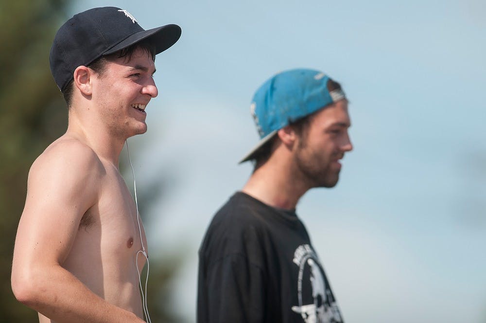 <p>Agricultural industries sophomore Mitchel Fuerstenau watches fellow skaters Sept. 28, 2014, at the Ranney Skate Park. "I've skated Ranney since middle school," Fuerstenau said. "I love it it's the park for me." Raymond Williams/The State News</p>