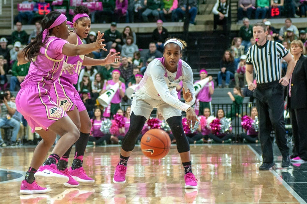 Redshirt-junior guard Shay Colley (0) passes the ball during the women’s basketball game against Purdue at Breslin Center on Feb. 3, 2019. The Spartans defeated the Boilmakers 74-66.