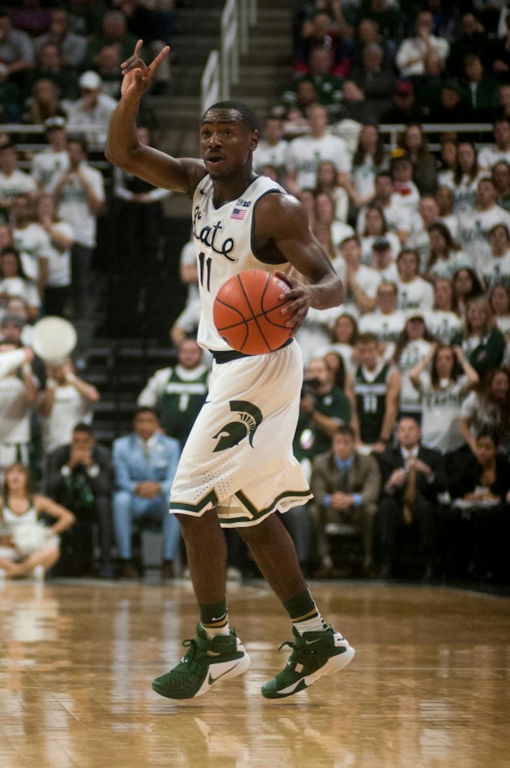 Lourawls 'Tum Tum' Nairn Jr., 11, calls a play during the first half of the basketball game against the University of Louisville on Dec. 2, 2015 at the Breslin Center in East Lansing, MI. The Spartans defeated the Cardinals, 71-67.