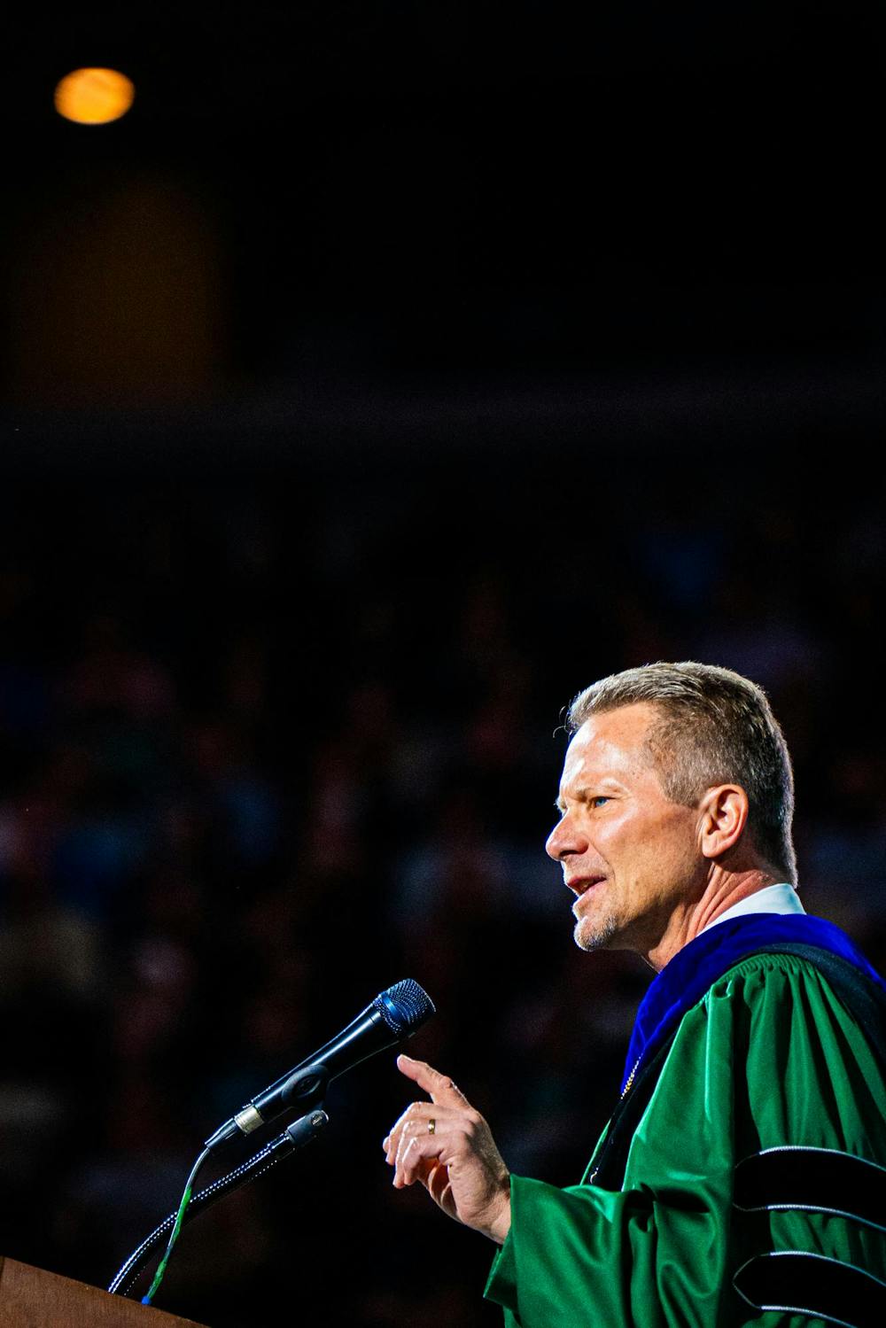 MSU president Kevin Guskiewicz speaks to alumni during the fall 2024 commencement ceremony at the Breslin Center on Dec. 14, 2024.