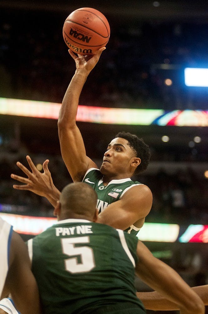 	<p>Sophomore guard Gary Harris shoots the ball during the game against Kentucky on Nov. 12, 2013, at the Champions Classic at The United Center in Chicago, IL. The Spartans defeated the Wildcats, 78-74. Khoa Nguyen/The State News</p>