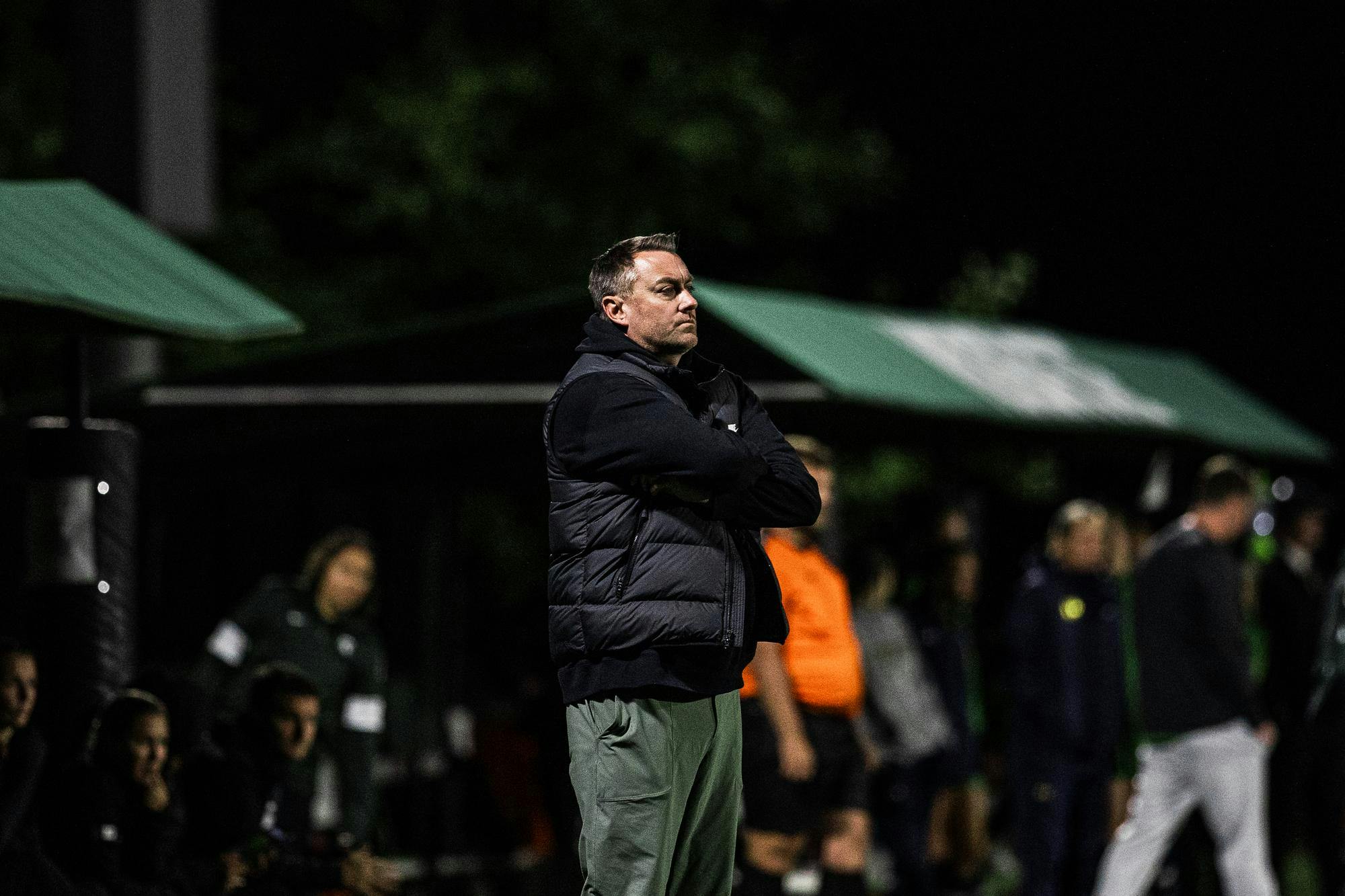 Michigan State head coach, Jeff Hosler, watches his team attack the opposing goal