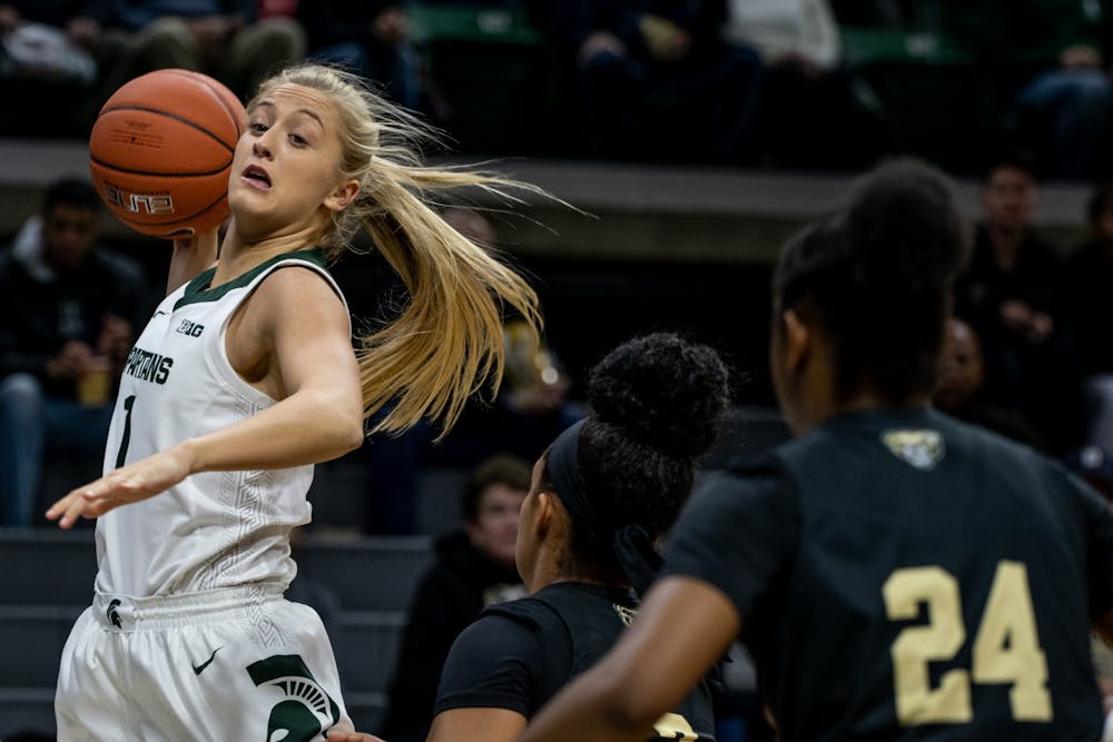 <p>Sophomore forward Tory Ozment (1) catches a pass during the game against Oakland Nov. 19, 2019 at Breslin Center. The Spartans defeated the Golden Grizzlies, 76-56.</p>
