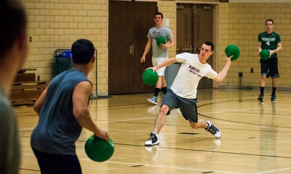 History senior Jason Andrews throws a ball during a dodgeball practice on March 16, 2017 at IM Sports-Circle. The team practices Tuesdays and Thursdays from 8-10 P.M.