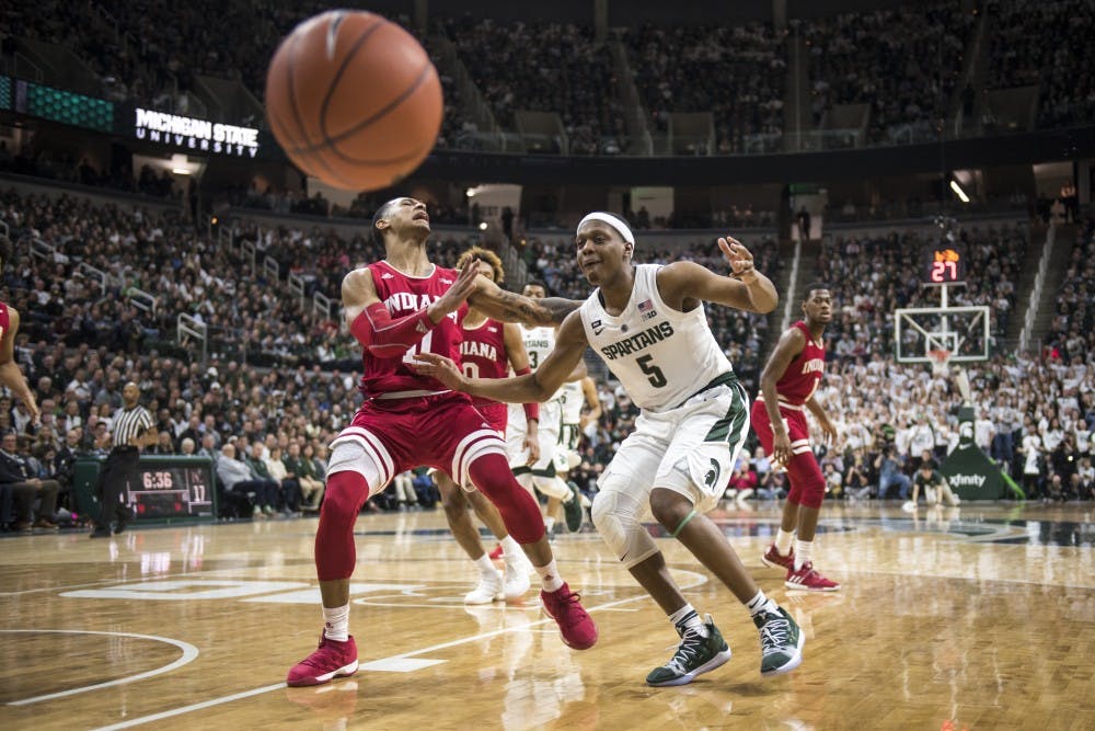 <p>Junior guard Cassius Winston (5) loses control of the ball during the men's basketball game against Indiana Feb. 2, 2019 at Breslin Center. Nic Antaya/The State News</p>