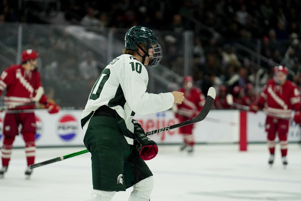 <p>Michigan State Spartans forward Tommi Männistö (10) shoots and is denied by Wisconsin Badgers goaltender Kyle McClellan at Munn Ice Arena on Nov. 17, 2023.</p>