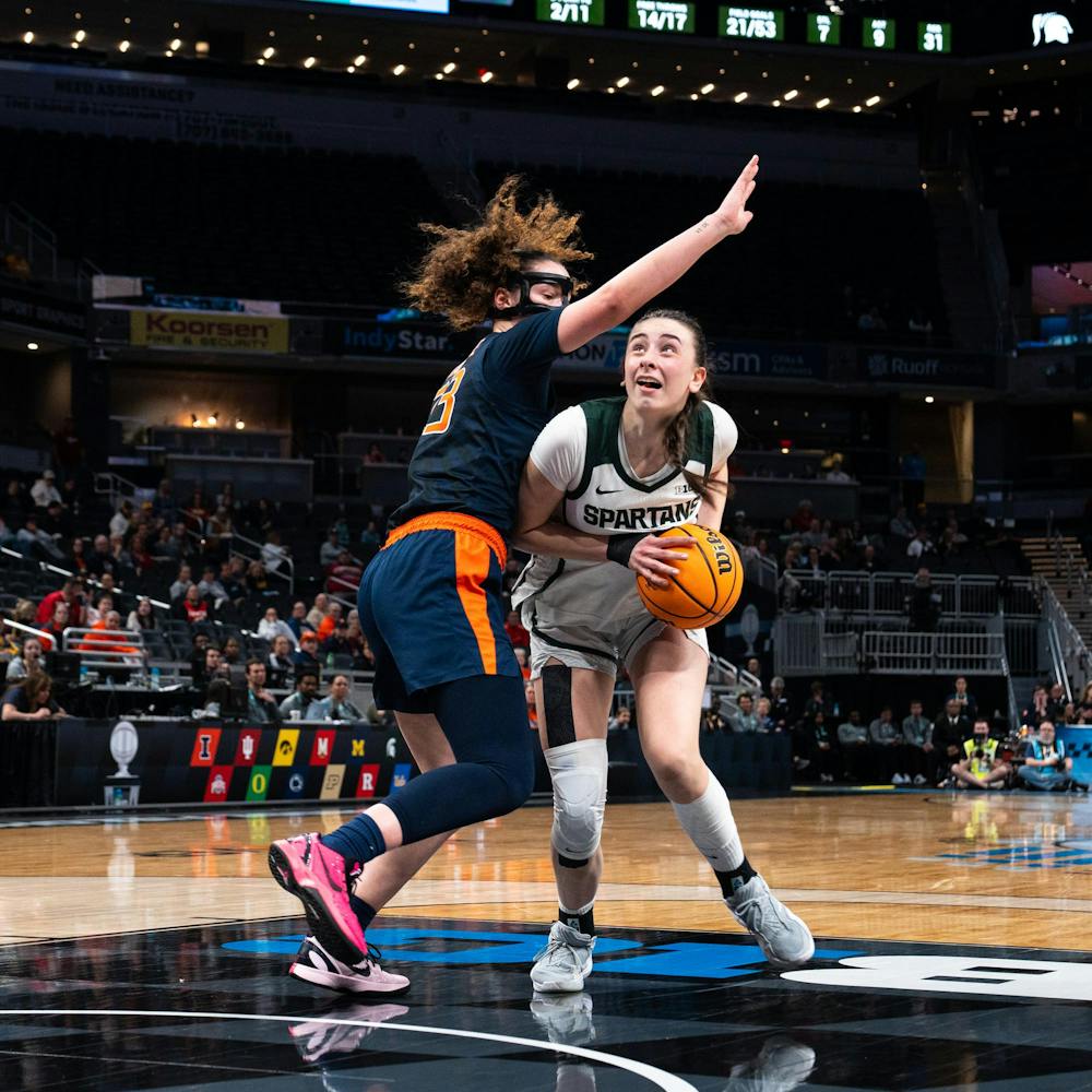 MSU So. F, Inés Sotelo (10), looks to attack the net while being defended by an Illinois player in the Gainbridge Fieldhouse in Indianapolis, IN on March 5, 2026.