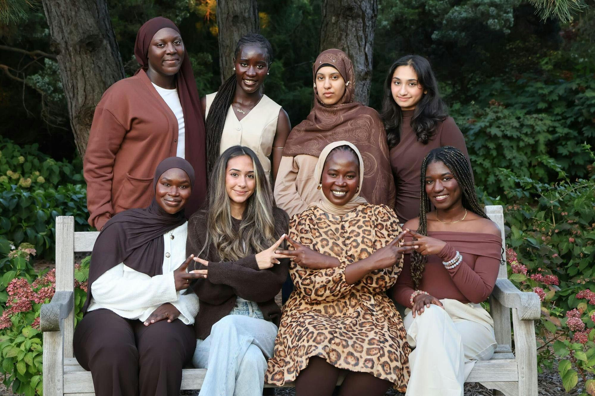 <p>Executive board members of sorority Beta Kappa Mu pose for a portrait on Michigan State University's campus. </p>