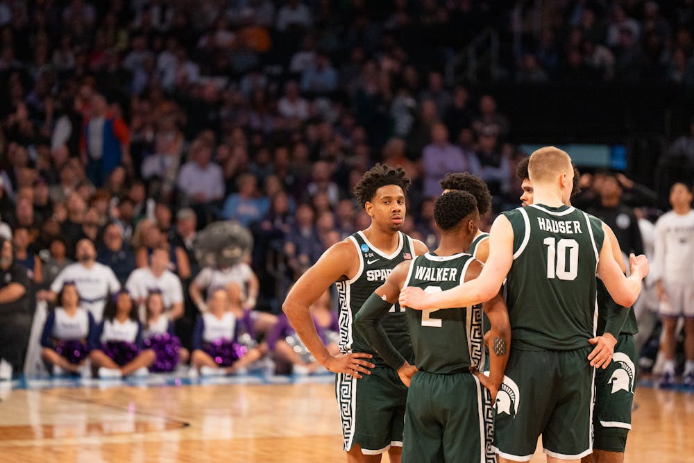 Michigan State huddles during the Spartans' Sweet Sixteen matchup with Kansas State at Madison Square Garden on Mar. 23, 2023. The Spartans lost to the Wildcats 98-93 in overtime.