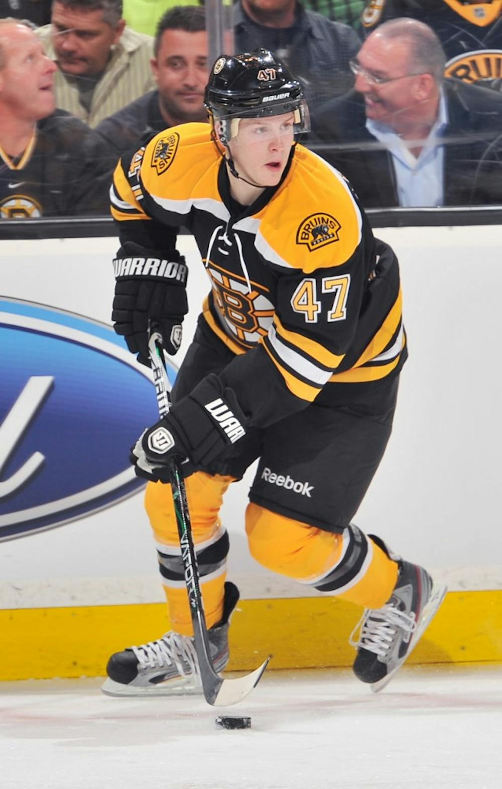 Torey Krug #47 of the Boston Bruins skates with the puck against the Pittsburgh Penguins at the TD Garden on April 3, 2012 in Boston, Massachusetts.  Photo courtesy of Steve Babineau/NHLI via Getty Images