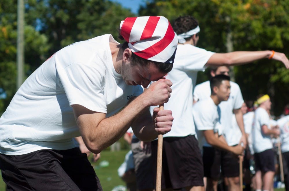 <p>Applied engineering senior Ian McGregor participates in an obstacle course during the annual Sigma Olympics, hosted by Sigma Kappa, on Sept. 27, 2015, at Patriarche Park in East Lansing.</p>