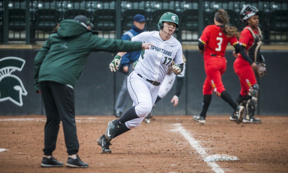 Freshman catcher and third baseman Kelcey Carrasco (17) rounds first base during the game against Maryland on March 31, 2017 at Secchia Stadium. The Spartans defeated the Terrapins, 11-3.