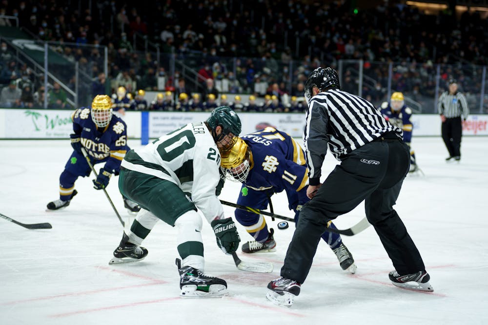 <p>Face off between Michigan State junior Josh Nodler and Notre Dame freshman Hunter Strand on Feb. 18, 2022. Spartans lost 2-1 against Notre Dame.</p><p><br/><br/><br/><br/><br/><br/></p>