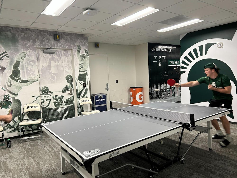 <p>MSU hockey junior Tiernan Shoudy keeps a pingpong rally alive on Nov. 1, 2024. Junior Karsen Dorwart said some members of the team play for about an hour every day.</p>