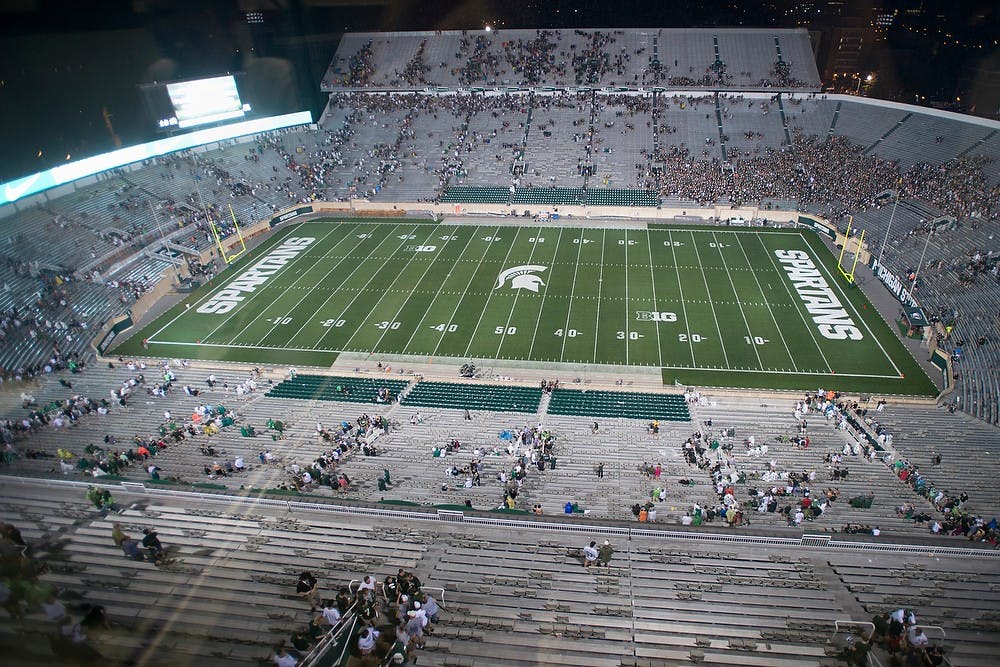 	<p>Attendees evacuate Spartan Stadium after some severe weather caused lightning strikes in the area during <span class="caps">MSU</span>&#8217;s game against Western Michigan on Aug. 30, 2013. Fans were asked to leave the stadium, but many retreated to the concourse. Julia Nagy/The State News</p>