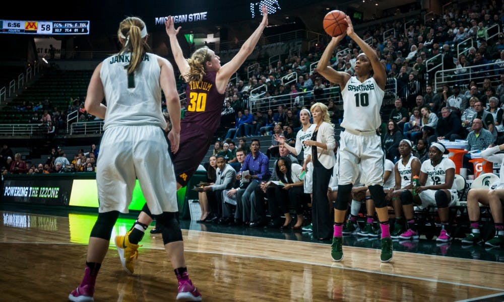 Senior guard Branndais Agee (10) shoots over Minnesota Forward (30) during the women?s basketball game against Minnesota on Feb. 16, 2017 at Breslin Center. The Spartans defeated by the Golden Gophers, 85-69.