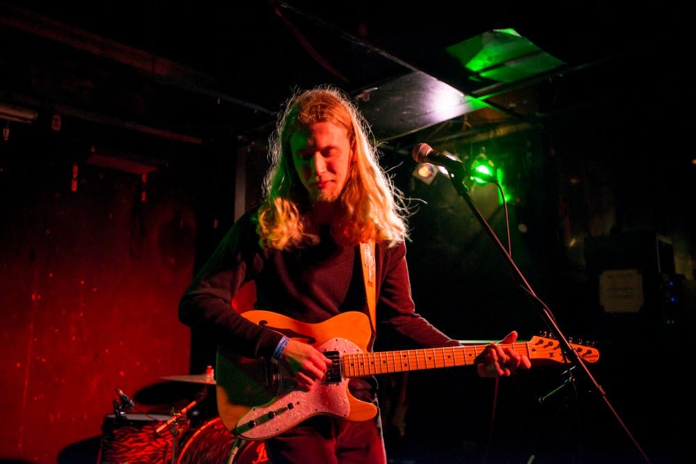 Monte pride performs a song during his show on April 8, 2017 at at Mac's Bar at 2700 E. Michigan Ave in Lansing. Pride is a folk singer-songwriter and finger style guitarist.