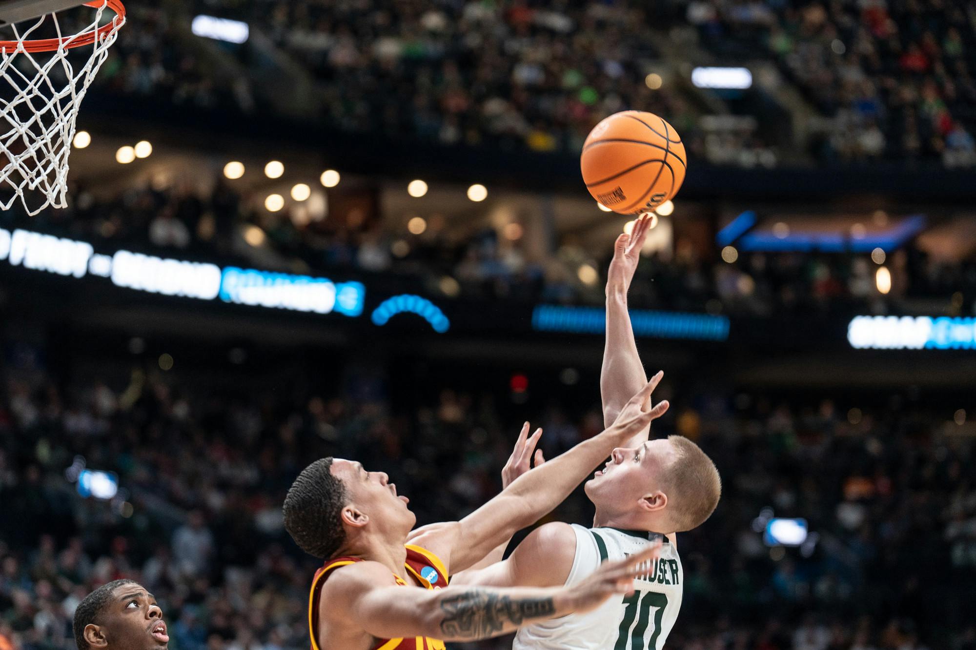 Graduate student forward Joey Hauser shoots the ball at Nationwide Arena in Columbus, Ohio on March 17, 2023. The Spartans beat the Trojans, 72-62 in the first round of March Madness.