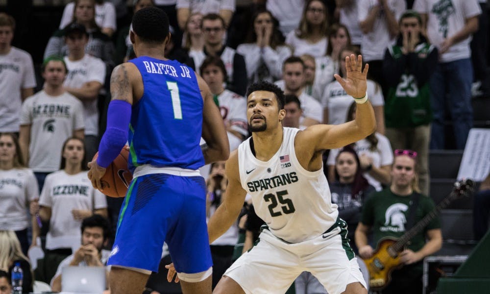 Red shirt senior forward Kenny Goins (25) blocks the ball during the game against Florida Gulf Coast University at Breslin Center on Nov. 11, 2018. The Spartans defeated the Eagles, 106-82.