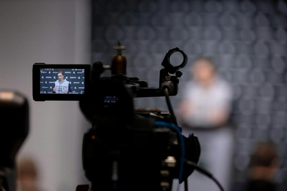 <p>Cameras record Michigan State head women's basketball coach Robyn Falick as she talks during a press conference at the Breslin Center in East Lansing, Mich., on Tuesday, Sept. 22, 2026.</p>