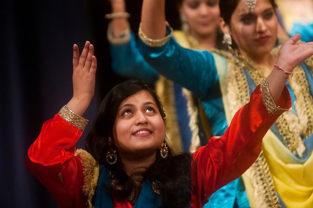 	<p>Graduate student Portia Banerjee dances during Sargam on Nov. 23, 2013, at Pasant Theatre. Sargam is an annual event by the Indian Students Organization, and this year&#8217;s performance was a Bollywood musical theme.</p>