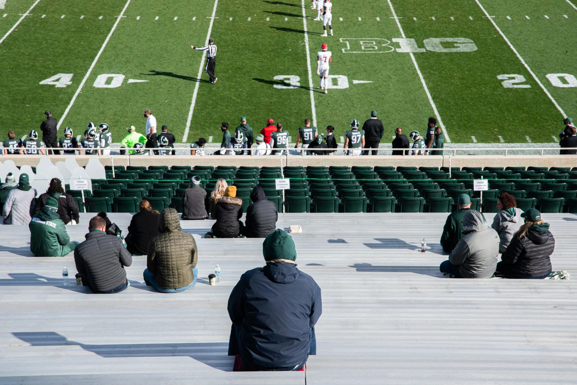 Fans socially distance at Spartan Stadium on Oct. 24, 2020 during a football game against Rutgers.