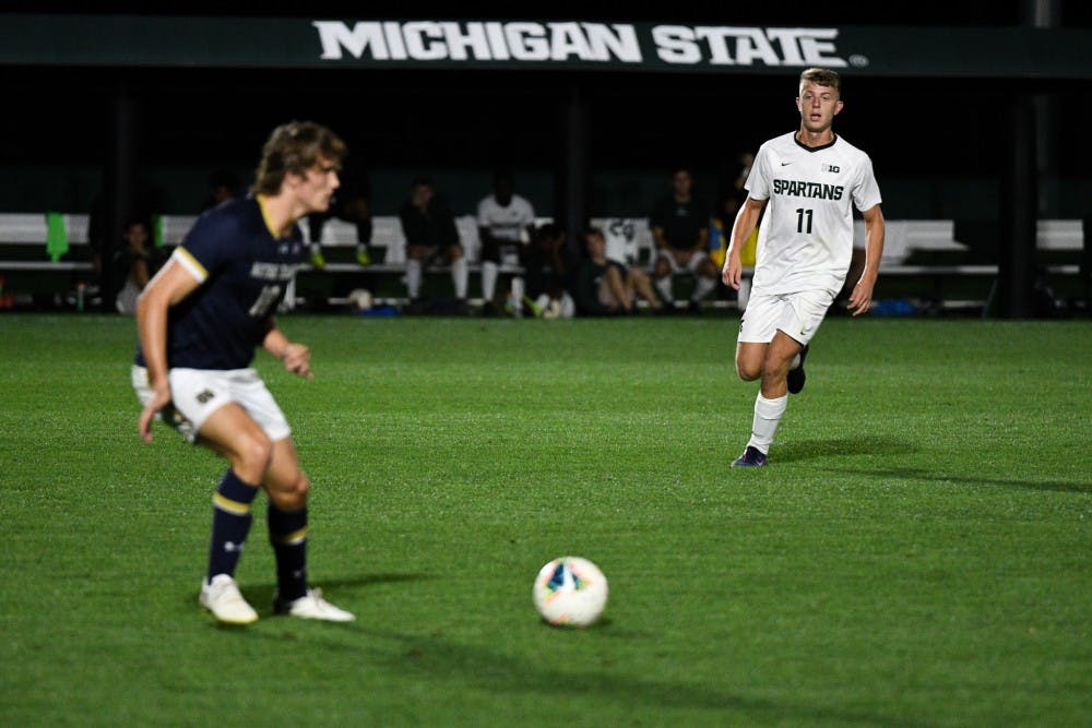 Freshman forward Gianni Ferri (11) chases down a Notre Dame player during the game at DeMartin field on September 24, 2019. The Spartans lost to the Fighting Irish 0-1. 
