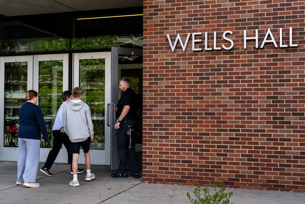<p>Michigan State University Police respond to the evacuation of Wells Hall due to the presence of unknown chemicals on campus in East Lansing, Mich., on Monday, April 27, 2026.</p>
