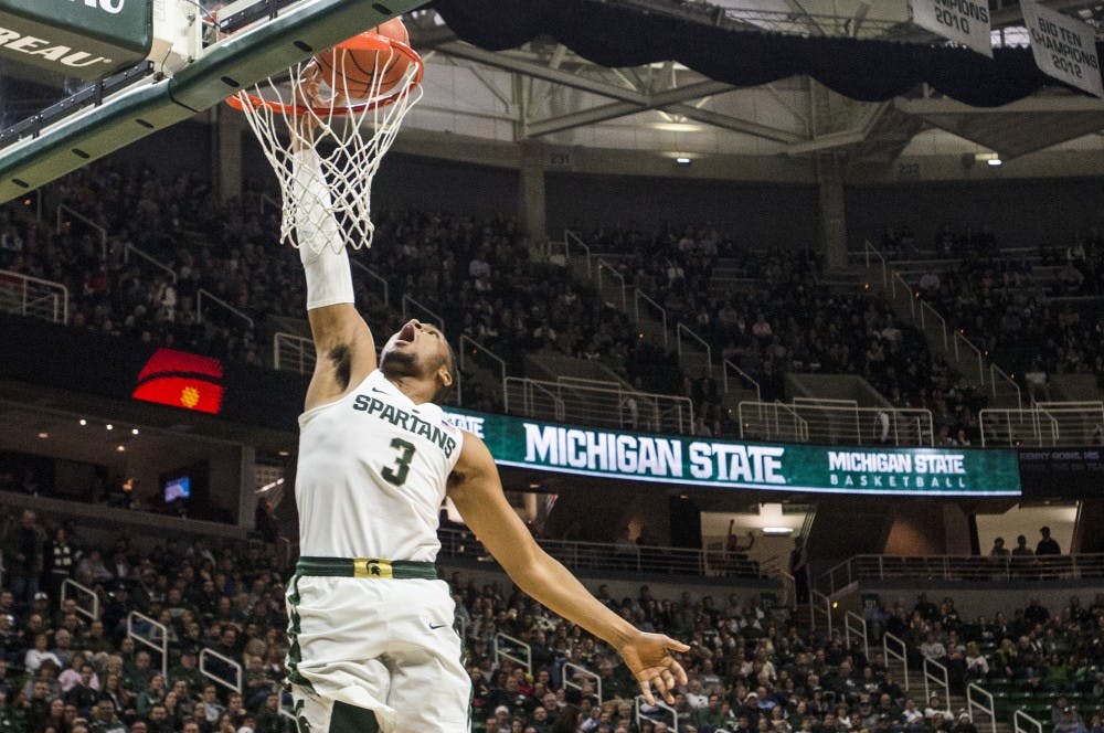 Senior guard Alvin Ellis III (3) goes for a layup during the first half of the men's basketball game against Rutgers on Jan. 4, 2017 at Breslin Center. 