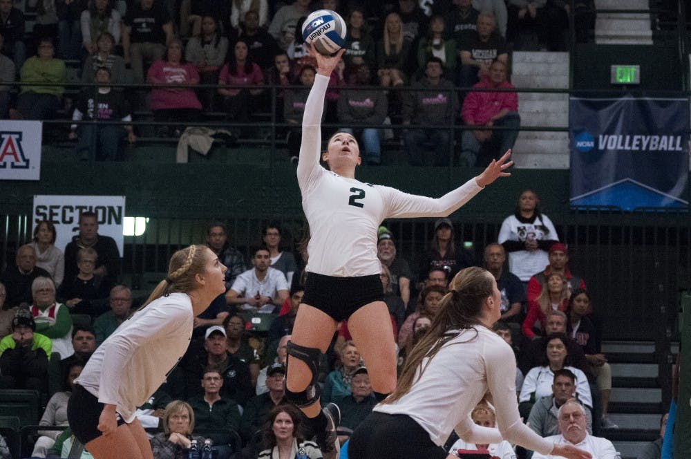 Junior outside hitter Autumn Bailey (2) hits the ball during the game against Arizona on Dec. 3, 2016 at Jenison Field House. The Spartans were defeated by the Wildcats, 3-2.