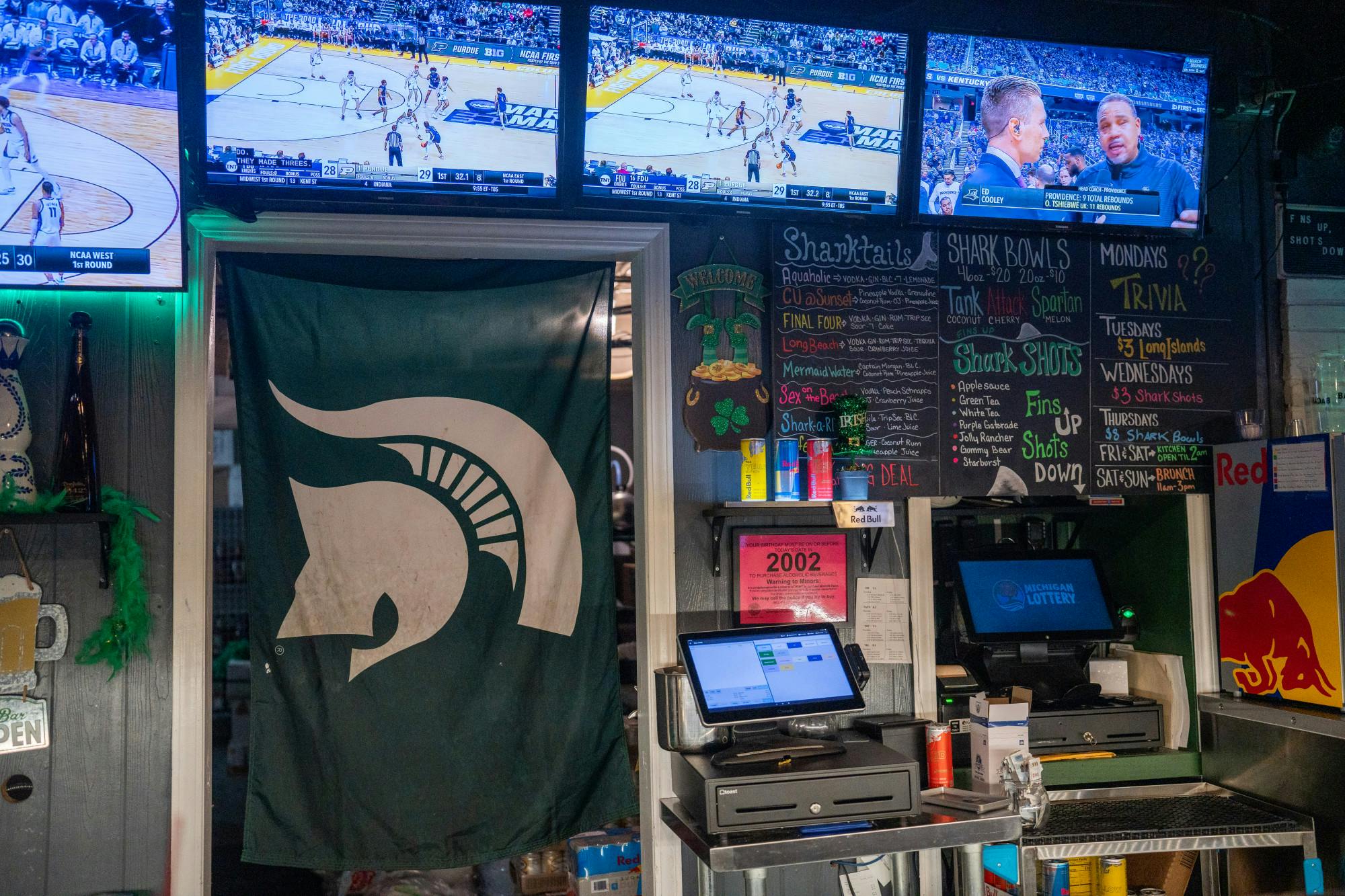 Behind the bar at Landshark Bar & Grill during St. Patrick's day on March 17, 2023. 