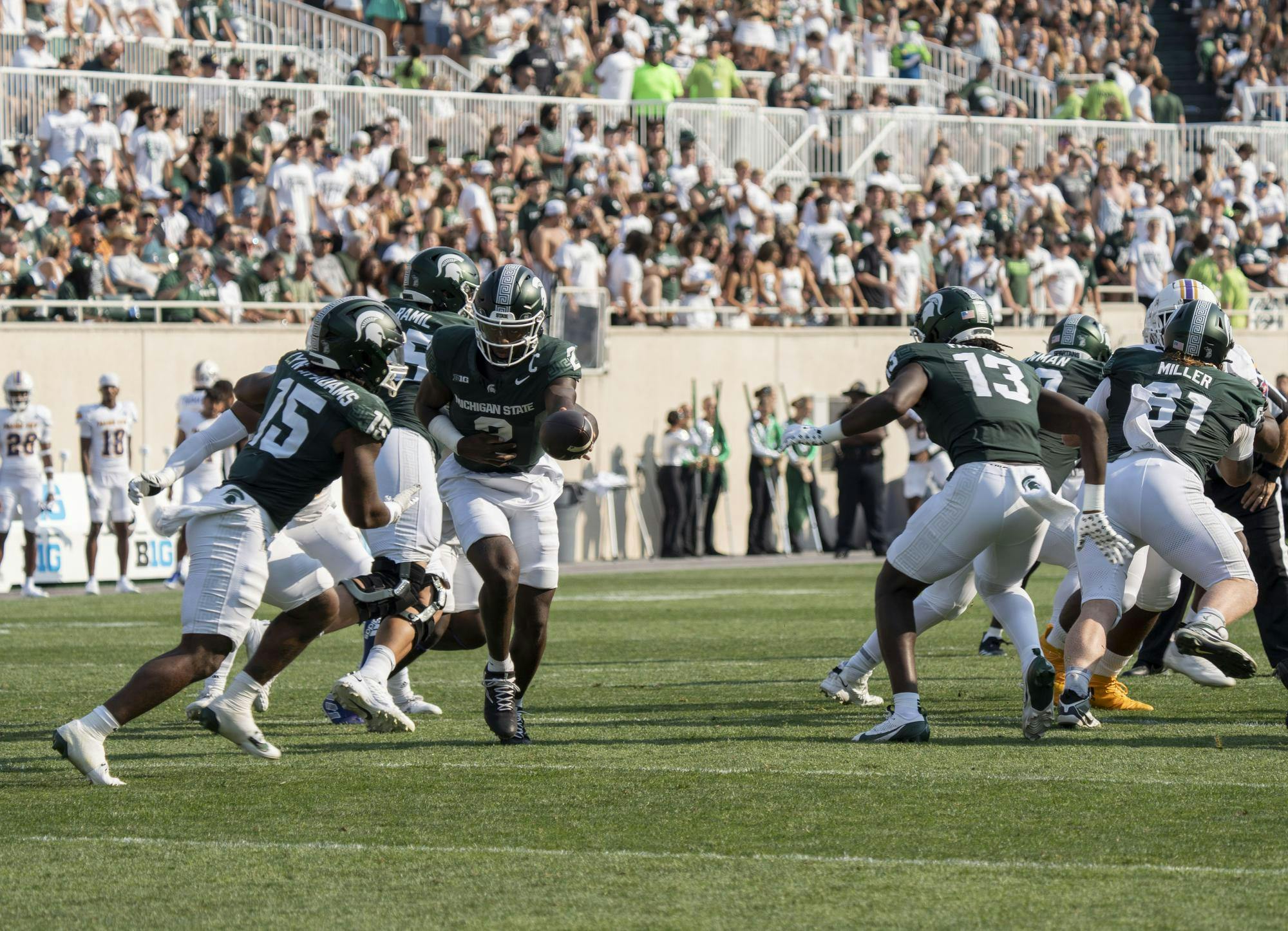 <p>Sophomore quarterback Aiden Chiles (2) passes the ball to sixth year running back Kay'ron Lynch-Adams (15) during the MSU vs Prairie View football game on Sept. 14, 2024.</p>