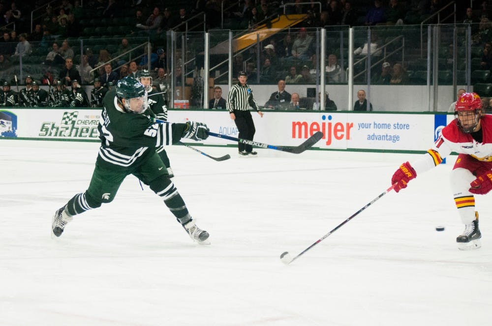 Freshman defenseman Mitch Eliot (52) shoots the puck during the game against Ferris State on Nov. 11, 2016 at Munn Ice Arena. The spartans were defeated by the bulldogs, x-x. 