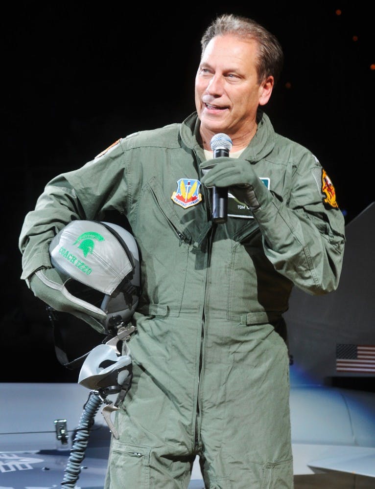 	<p>Dressed as a fighter jet pilot, men&#8217;s basketball head coach Tom Izzo speaks on Oct. 14, 2011, during Midnight Madness at Breslin Center. </p>