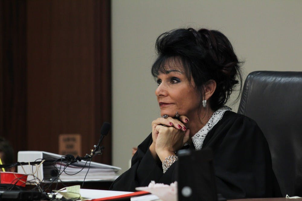 <p>Judge Rosemarie Aquilina listens to one of ex-MSU doctor Larry Nassar's attorneys during a court hearing at Veterans Memorial Courthouse Aug. 3.</p>