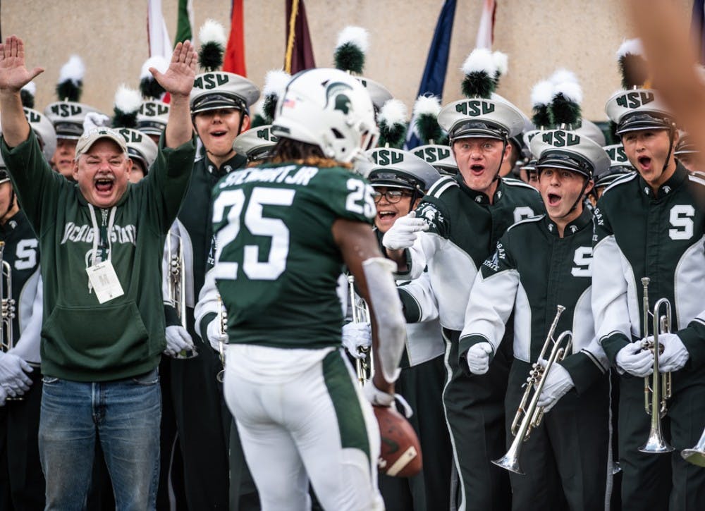 MSU marching band reacts to Darrell Stewart Jr.’s touchdown during the homecoming game against Indiana on Sept. 28, 2019 at Spartan Stadium. The Spartans led the Hoosiers 21-14 at halftime.