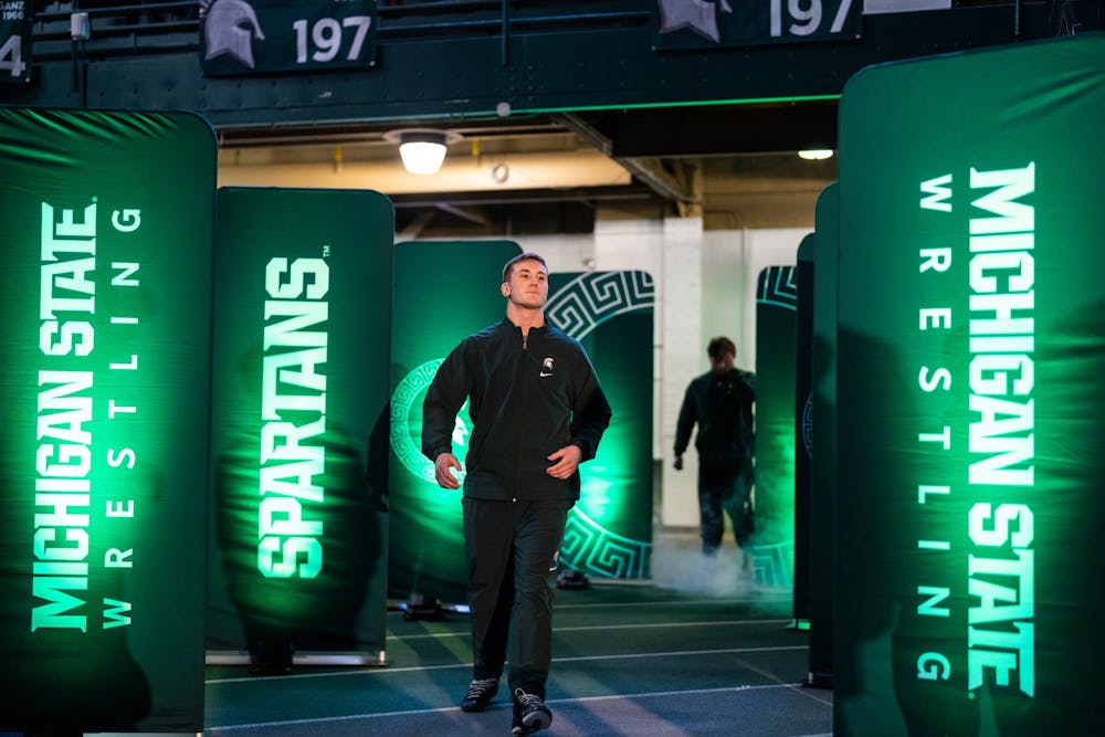 MSU R-Jr. Wt. 197, Kael Wisler, walks out during his introduction in the Jenison Field House in East Lansing, MI on Feb. 8, 2026.