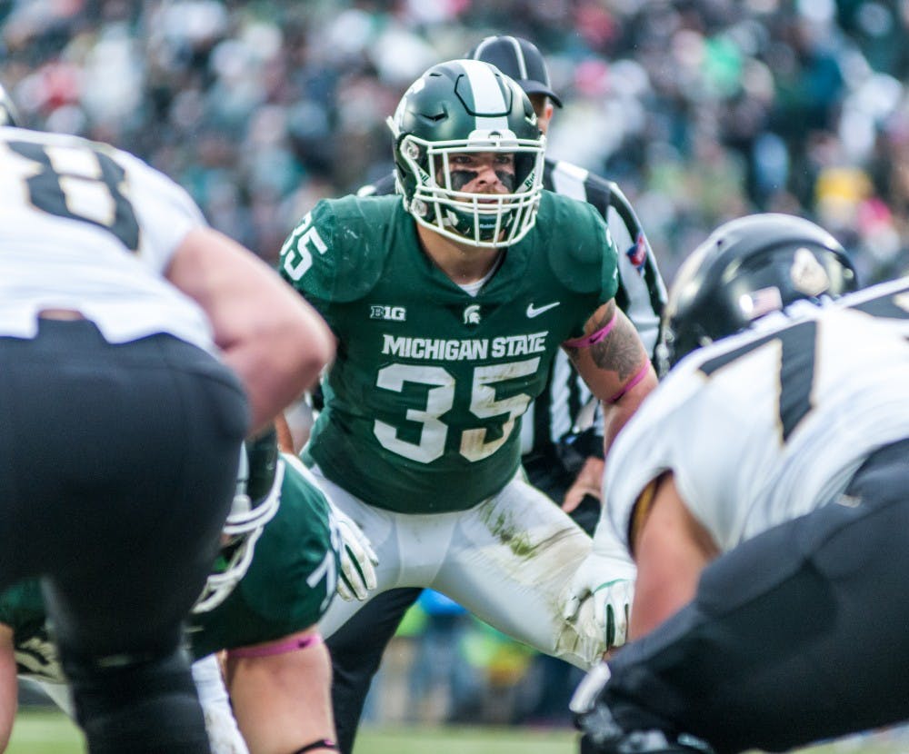 Junior linebacker Joe Bachie (35) looks into the backfield during the game against Purdue on Oct. 27, 2018 at Spartan Stadium. The Spartans defeated the Boilermakers 23-13.