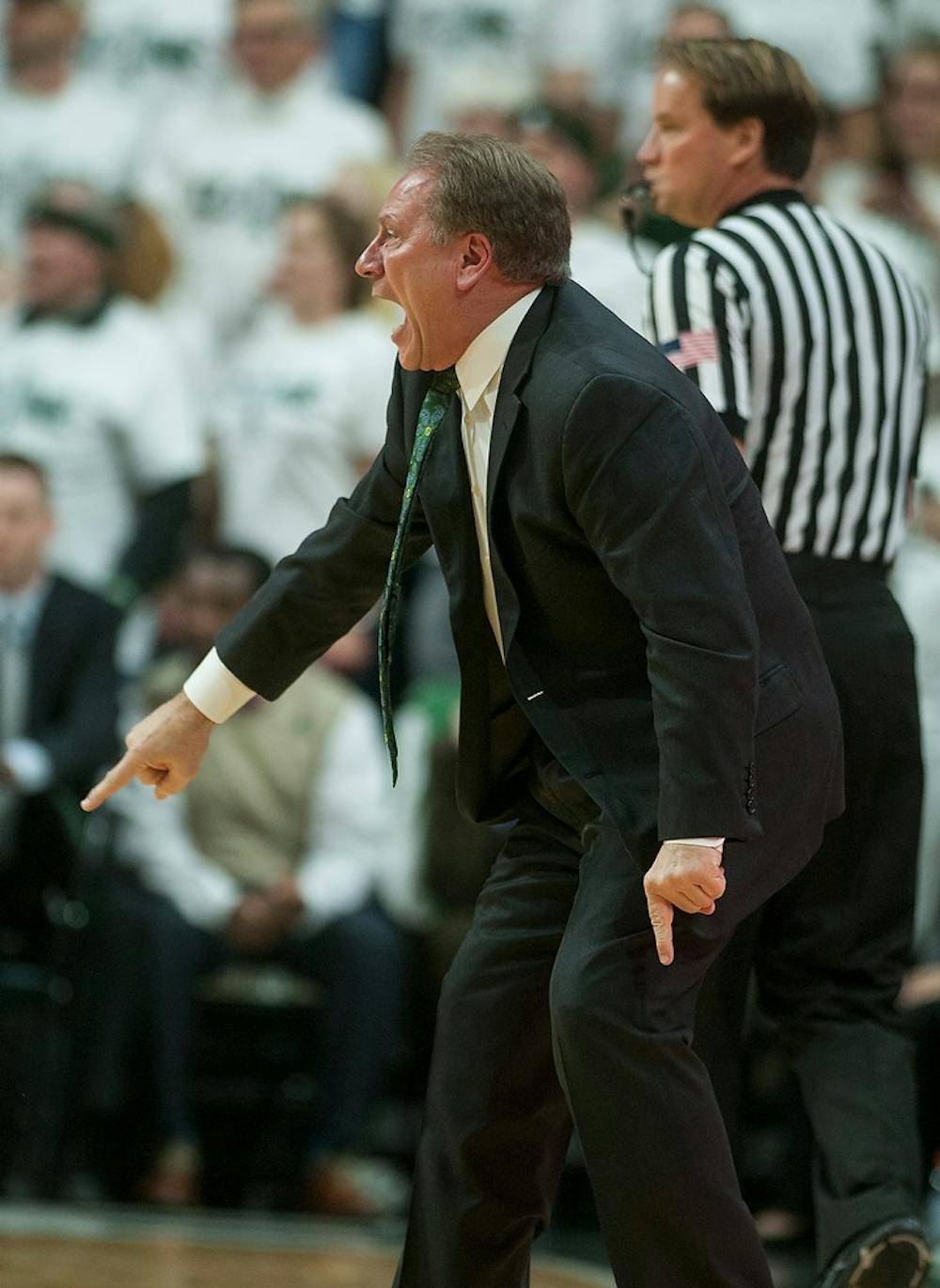 <p>Head coach Tom Izzo yells to his players on the court Jan. 5, 2015, during the game against Indiana at Breslin Center. The Spartans defeated the Hoosiers, 70-50. Erin Hampton/The State News</p>