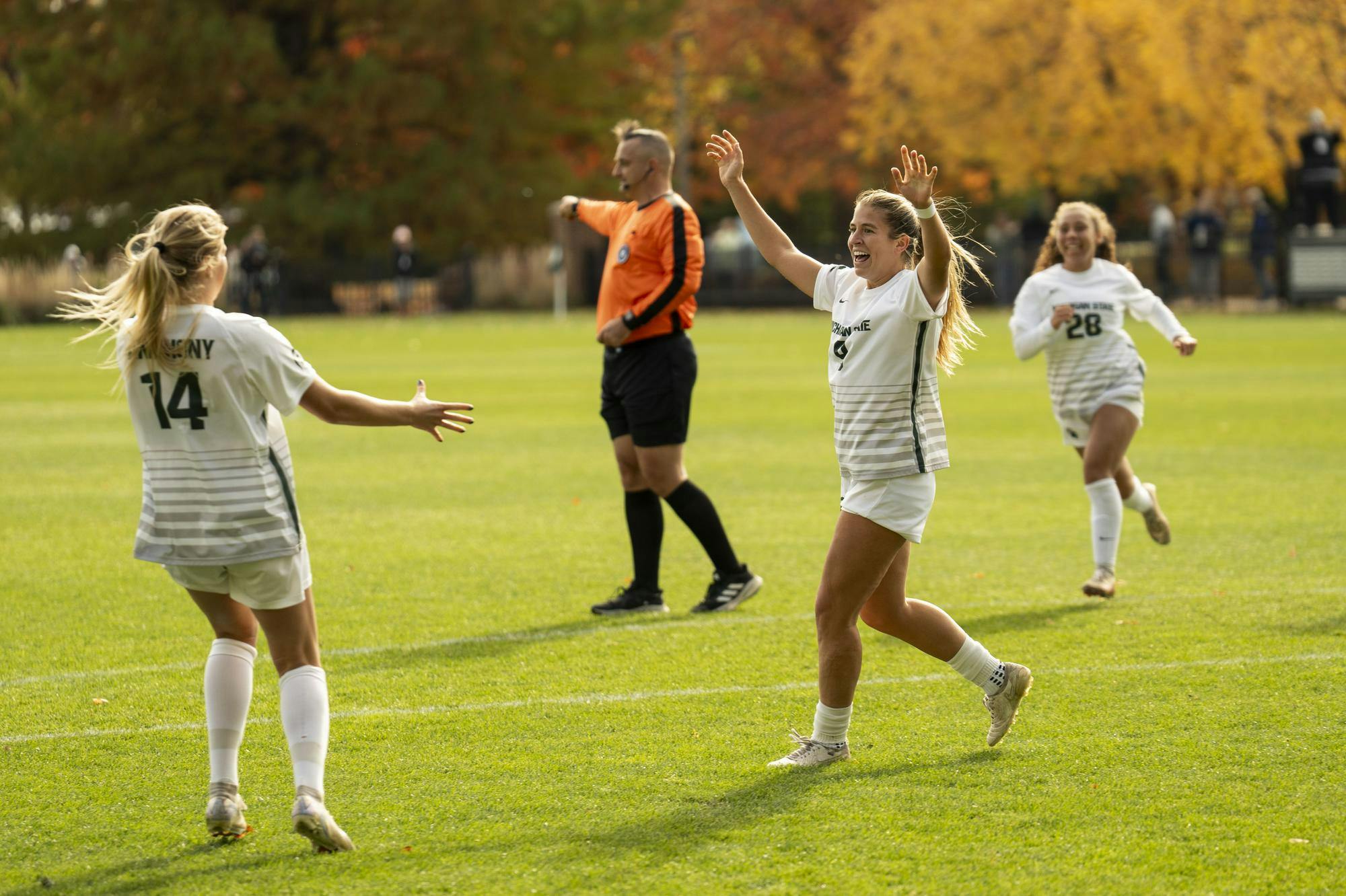 The Michigan State University women’s soccer team celebrates after scoring their third goal in the MSU vs. Purdue game on Oct. 27, 2024. MSU won the game 3-1. 