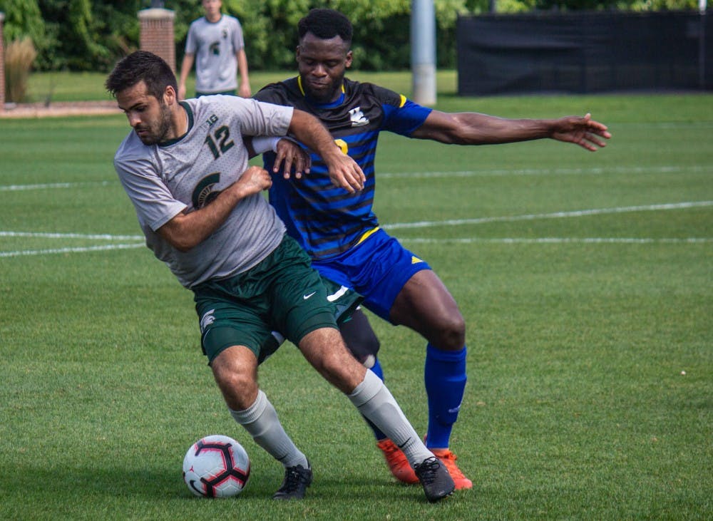 Senior defense John Freitag (12), takes the ball from Riverside’s forward Antonio Lokossou (8) during the game against UC Riverside on Sept. 2, 2018 at DeMartin Stadium. The Spartans defeated the Highlanders: 5-1.