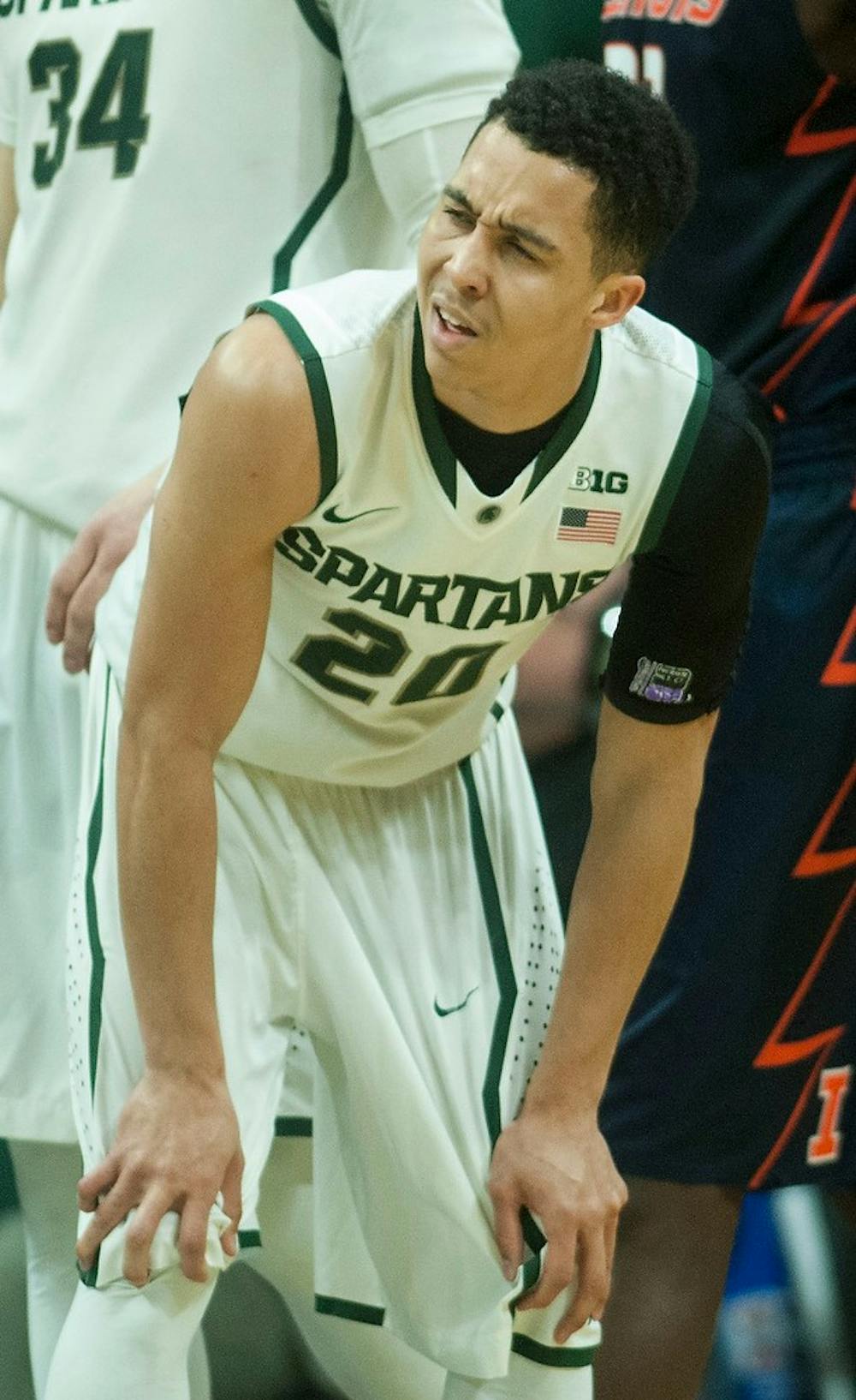 <p>Senior guard Travis Trice reacts to a foul called on him Feb. 7, 2015, during the game against Illinois at Breslin Center. The Spartans were defeated by the Fighting Illini, 59-54. Erin Hampton/The State News</p>